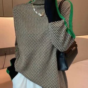 Urban geometric turtleneck sweater - colors green black & white. NWT - size M